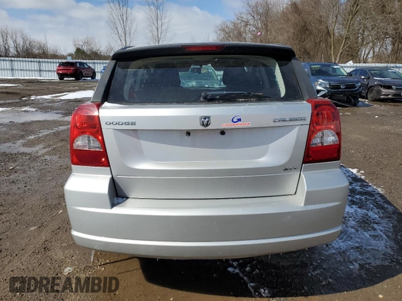 2010 Dodge Caliber SXT z VIN 1B3CB4HA4AD597158, wystawiony jako Copart lot #51757335 z przebiegiem 128 791 mil mil oraz Czysty tytuł • Clean title. Historia ofert i sprzedaży dostępna na DreamBid. Obrazek 6.