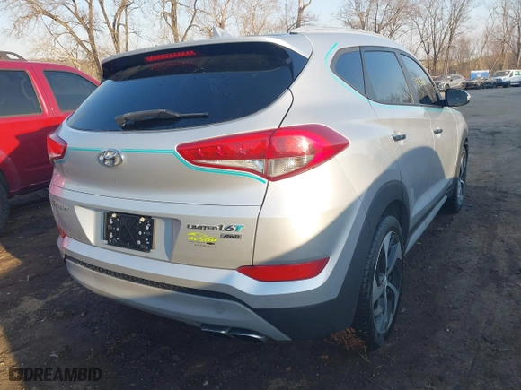 2018 Hyundai Tucson Value with VIN KM8J3CA23JU651464, listed as a IAAI auction lot 41757165 with 72,339 mi miles. Bid and sale history available at carsss.com. Image 4.