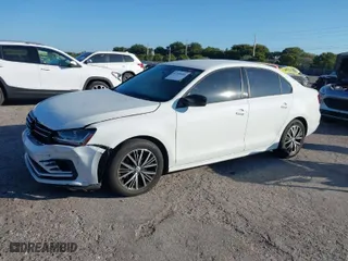2018 Volkswagen Jetta 1.4T SE with VIN 3VWDB7AJXJM225016, listed as a IAAI auction lot 41309884 with 57,773 mi miles. Bid and sale history available at carsss.com. Image 2.