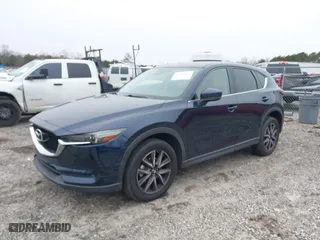 2017 Mazda CX-5 Grand Touring with VIN JM3KFBDL9H0180038, listed as a IAAI auction lot 41394047 with 111,581 mi miles. Bid and sale history available at carsss.com. Image 18.