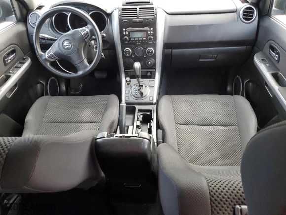 2012 Suzuki Grand Vitara Premium with VIN JS3TD0D6XC4100380, listed as a Copart auction lot 79930594 with 132,712 mi miles and Salvage Title. Bid and sale history available at carsss.com. Image 8.
