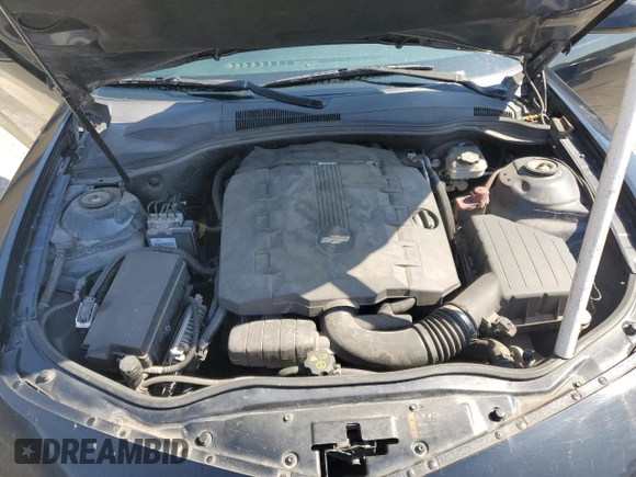 2014 Chevrolet Camaro LS z VIN 2G1FA1E35E9255913, wystawiony jako Copart lot #56976695 z przebiegiem 231 070 mil mil oraz Szkoda całkowita • Salvage title. Historia ofert i sprzedaży dostępna na DreamBid. Obrazek 11.