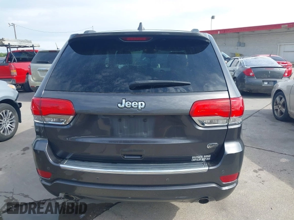 2017 Jeep Grand Cherokee Overland z VIN 1C4RJECG1HC614740, wystawiony jako IAAI lot #41912523 z przebiegiem 177 353 mil mil oraz . Historia ofert i sprzedaży dostępna na DreamBid. Obrazek 16.