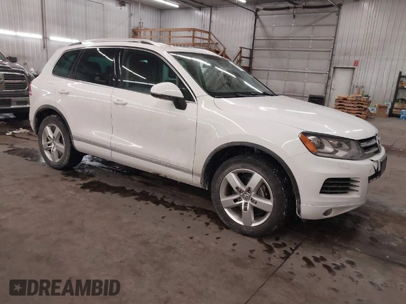 2013 Volkswagen Touareg Lux with VIN WVGEF9BP5DD011511, listed as a IAAI auction lot 41608840 with 167,350 mi miles and . Bid and sale history available at DreamBid. Image 1.