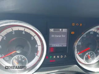 2014 Dodge Grand Caravan SXT with VIN 2C4RDGCG7ER265931, listed as a IAAI auction lot 42141644 with 205,968 mi miles and . Bid and sale history available at DreamBid. Image 7.