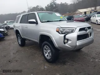2014 Toyota 4Runner Limited with VIN JTEBU5JR5E5198734, listed as a IAAI auction lot 41513562 with 322,459 mi miles. Bid and sale history available at carsss.com. Image 1.