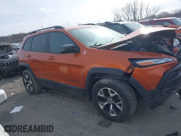 2015 Jeep Cherokee Trailhawk with VIN 1C4PJMBB3FW642266, listed as a IAAI auction lot 41510571 with 72,030 mi miles and . Bid and sale history available at DreamBid. Image 13.