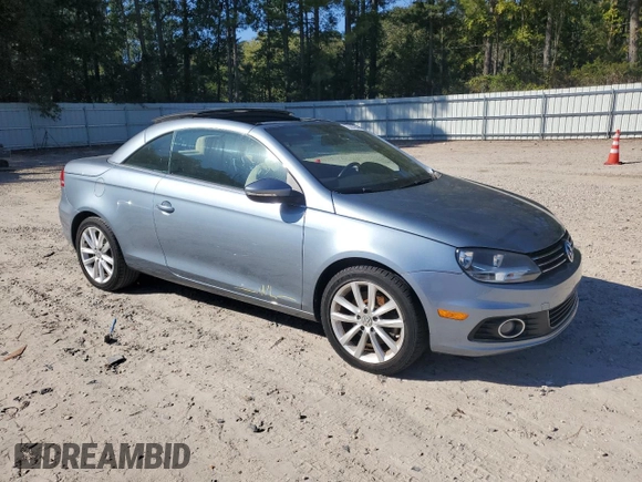 2015 Volkswagen Eos Komfort with VIN WVWBW8AH3FV000614, listed as a Copart auction lot 76080904 with 75,202 mi miles and Clean Title. Bid and sale history available at DreamBid. Image 4.