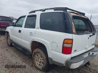 2003 Chevrolet Tahoe LS with VIN 1GNEK13Z63R135474, listed as a IAAI auction lot 42127546 with 318,623 mi miles and . Bid and sale history available at DreamBid. Image 3.