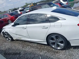 2019 Honda Accord Touring with VIN 1HGCV2F96KA009252, listed as a IAAI auction lot 42003043 with 76,249 mi miles and . Bid and sale history available at DreamBid. Image 14.