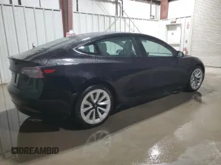 2023 Tesla Model 3 z VIN 5YJ3E1EA1PF452122, wystawiony jako Copart lot #63576995 z przebiegiem 104 907 mil mil oraz Czysty tytuł • Clean title. Historia ofert i sprzedaży dostępna na DreamBid. Obrazek 3.