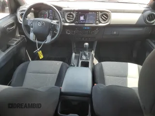 2021 Toyota Tacoma SR with VIN 3TMCZ5AN4MM394406, listed as a Copart auction lot 62268025 with 110,891 mi miles and Salvage title. Bid and sale history available at DreamBid. Image 8.