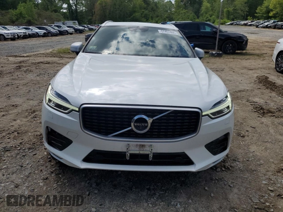 2019 Volvo XC60 R-Design z VIN LYVA22RMXKB234121, wystawiony jako Copart lot #57457405 z przebiegiem 93 792 mil mil oraz Szkoda całkowita • Salvage title. Historia ofert i sprzedaży dostępna na DreamBid. Obrazek 5.