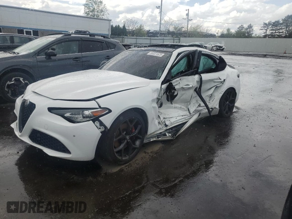 2021 Alfa Romeo Giulia Ti z VIN ZARFANBN1M7648754, wystawiony jako Copart lot #55331525 z przebiegiem Nie podano mil oraz Szkoda całkowita • Salvage title. Historia ofert i sprzedaży dostępna na DreamBid. Obrazek 1.