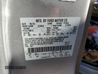 2007 Mercury Mariner Convenience z VIN 4M2YU80Z47KJ11826, wystawiony jako Copart lot #77327954 z przebiegiem 195 320 mil mil oraz Szkody całkowita. Historia ofert i sprzedaży dostępna na DreamBid. Obrazek 14.