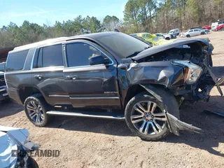 2018 GMC Yukon Denali with VIN 1GKS2CKJ6JR303263, listed as a IAAI auction lot 41633514 with 130,990 mi miles. Bid and sale history available at carsss.com. Image 12.
