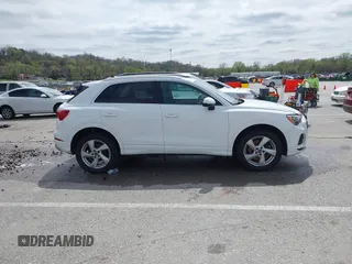 2021 Audi Q3 Premium with VIN WA1AUCF33M1096437, listed as a IAAI auction lot 41910411 with 86,837 mi miles and . Bid and sale history available at DreamBid. Image 14.
