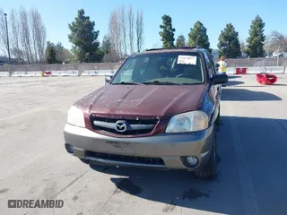 2001 Mazda Tribute LX with VIN 4F2YU08131KM39817, listed as a IAAI auction lot 41678877 with 210,715 mi miles. Bid and sale history available at carsss.com. Image 6.