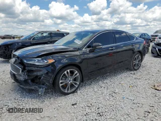 2019 Ford Fusion Titanium with VIN 3FA6P0D98KR124041, listed as a Copart auction lot 56575095 with 138,885 mi miles and Clean title. Bid and sale history available at DreamBid. Image 1.
