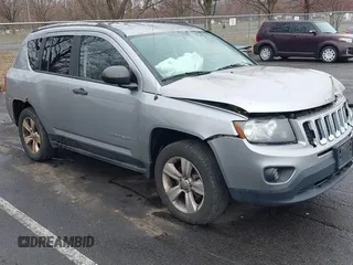 2014 Jeep Compass Sport with VIN 1C4NJDBB8ED734667, listed as a IAAI auction lot 41836914 with 221,028 mi miles. Bid and sale history available at carsss.com. Image 1.