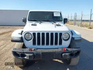 2020 Jeep Gladiator Rubicon with VIN 1C6JJTBG6LL187235, listed as a IAAI auction lot 42010374 with Not Provided miles and . Bid and sale history available at DreamBid. Image 12.