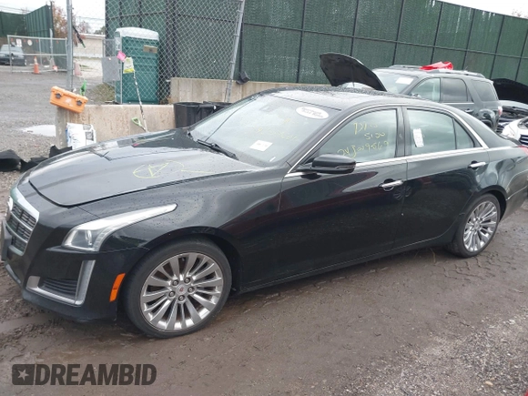 2014 Cadillac CTS Luxury AWD with VIN 1G6AX5SX9E0195923, listed as a IAAI auction lot 40946334 with Not Provided miles and . Bid and sale history available at carsss.com. Image 14.