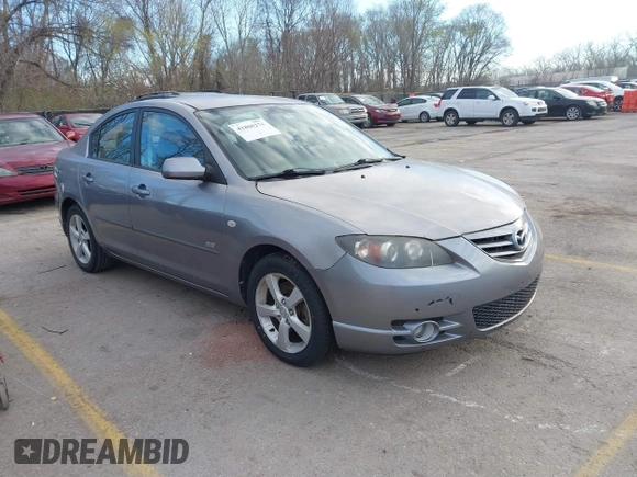 2005 Mazda 3 s with VIN JM1BK323551245843, listed as a IAAI auction lot 41860274 with 166,579 mi miles. Bid and sale history available at carsss.com. Image 1.