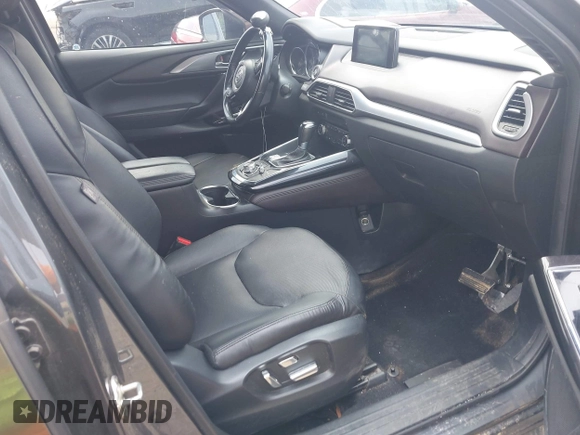 2018 Mazda CX-9 Grand Touring with VIN JM3TCADY7J0217595, listed as a IAAI auction lot 42381331 with 130,604 mi miles and . Bid and sale history available at DreamBid. Image 5.