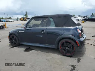 2007 MINI Convertible S with VIN WMWRH33597TJ43818, listed as a Copart auction lot 64623075 with 104,889 mi miles and Clean title. Bid and sale history available at DreamBid. Image 2.
