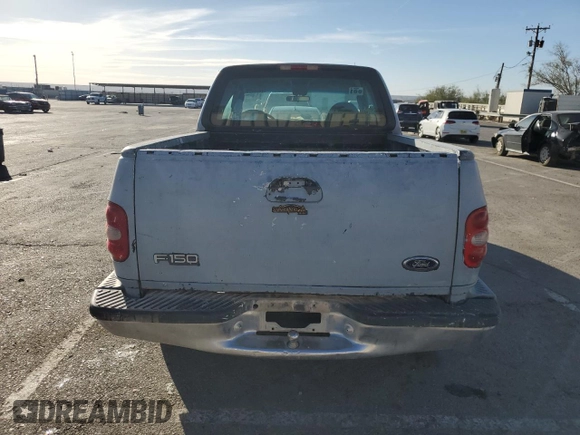 2000 Ford F-150 XL with VIN 1FTZX0723YKA02769, listed as a Copart auction lot 78722714 with 354,312 mi miles and Salvage title. Bid and sale history available at DreamBid. Image 6.