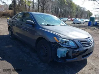 2007 Toyota Camry CE with VIN 4T1BE46KX7U115813, listed as a IAAI auction lot 41803314 with 165,233 mi miles. Bid and sale history available at carsss.com. Image 1.