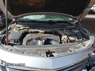 2014 Chevrolet Impala LT with VIN 1G1115SL6EU105818, listed as a IAAI auction lot 41678040 with 139,686 mi miles and . Bid and sale history available at DreamBid. Image 10.