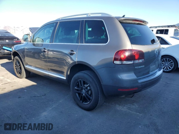 2010 Volkswagen Touareg VR6 with VIN WVGBF7A98AD001335, listed as a Copart auction lot 81735614 with 160,478 mi miles and Salvage Title. Bid and sale history available at DreamBid. Image 2.