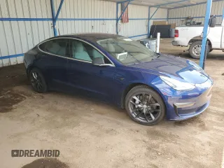 2018 Tesla Model 3 Long Range Battery z VIN 5YJ3E1EB3JF134664, wystawiony jako Copart lot #57288485 z przebiegiem Nie podano mil oraz Szkoda całkowita • Salvage title. Historia ofert i sprzedaży dostępna na DreamBid. Obrazek 4.