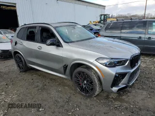 2023 BMW X5 M z VIN 5YMJU0C02P9N97072, wystawiony jako Copart lot #88469815 z przebiegiem 22 395 mil mil oraz Szkody całkowita. Historia ofert i sprzedaży dostępna na DreamBid. Obrazek 4.