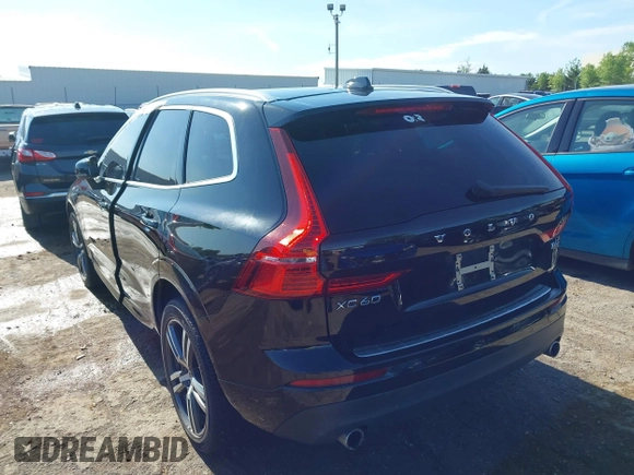 2018 Volvo XC60 Momentum with VIN YV4A22RK3J1040015, listed as a IAAI auction lot 42098399 with 57,130 mi miles and . Bid and sale history available at DreamBid. Image 3.