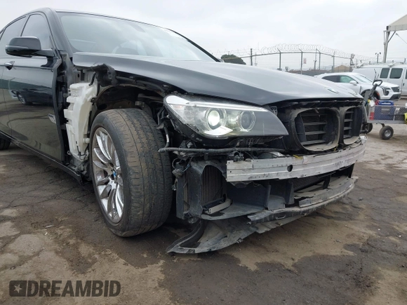 2015 BMW 7 Series 740i with VIN WBAYA6C54FG273188, listed as a IAAI auction lot 42563572 with 70,675 mi miles and . Bid and sale history available at DreamBid. Image 6.