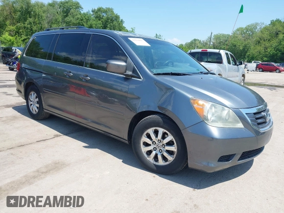 2010 Honda Odyssey EX-L z VIN 5FNRL3H76AB071871, wystawiony jako IAAI lot #42214867 z przebiegiem 255 116 mil mil oraz . Historia ofert i sprzedaży dostępna na DreamBid. Obrazek 1.