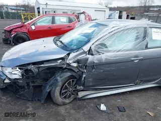 2017 Mitsubishi Lancer ES with VIN JA32U2FU7HU000552, listed as a IAAI auction lot 41868342 with 136,132 mi miles. Bid and sale history available at carsss.com. Image 6.