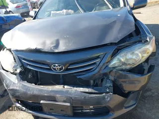 2013 Toyota Corolla L with VIN 5YFBU4EE7DP155925, listed as a IAAI auction lot 41858618 with 146,822 mi miles. Bid and sale history available at carsss.com. Image 6.