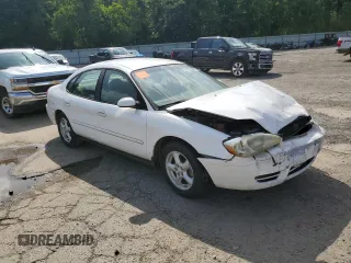 2004 Ford Taurus SES with VIN 1FAFP55U54A120509, listed as a Copart auction lot 61226285 with 270,891 mi miles and Salvage title. Bid and sale history available at DreamBid. Image 4.