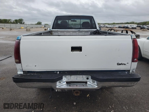 1989 GMC Sierra 2500 z VIN 1GTGK24K8KE532683, wystawiony jako Copart lot #51434114 z przebiegiem 79 134 mil mil oraz Szkody całkowita. Historia ofert i sprzedaży dostępna na DreamBid. Obrazek 6.