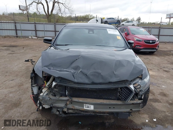 2013 Ford Taurus SHO with VIN 1FAHP2KT1DG113007, listed as a IAAI auction lot 41914541 with 50,630 mi miles and . Bid and sale history available at DreamBid. Image 13.