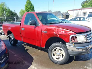 1999 Ford F-150 with VIN 1FTZF1723XNA23062, listed as a IAAI auction lot 42019826 with 232,648 mi miles and . Bid and sale history available at DreamBid. Image 13.