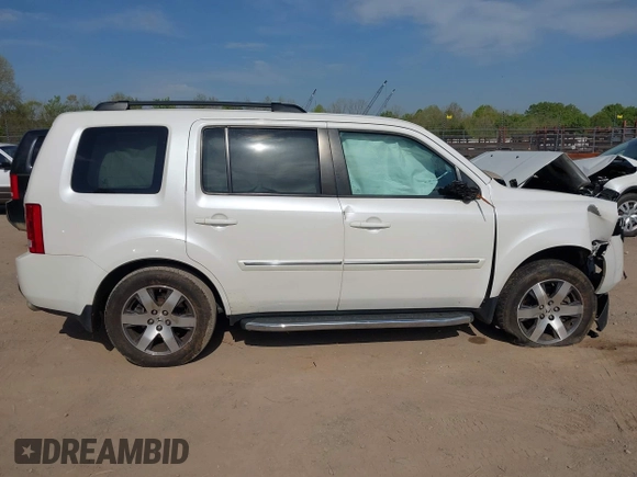 2013 Honda Pilot Touring with VIN 5FNYF3H92DB034731, listed as a IAAI auction lot 42049853 with 127,278 mi miles and . Bid and sale history available at DreamBid. Image 13.
