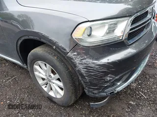 2015 Dodge Durango SXT with VIN 1C4RDJAG6FC177561, listed as a IAAI auction lot 42314437 with 104,898 mi miles and . Bid and sale history available at DreamBid. Image 6.