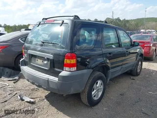 2007 Ford Escape XLS with VIN 1FMYU02Z47KA61994, listed as a IAAI auction lot 41795139 with 128,846 mi miles. Bid and sale history available at carsss.com. Image 4.