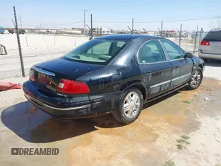 2000 Mercury Sable LS Premium with VIN 1MEFM55SXYA645345, listed as a IAAI auction lot 41778827 with 196,746 mi miles. Bid and sale history available at carsss.com. Image 4.