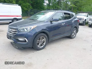 2017 Hyundai Santa Fe 2.4L z VIN 5XYZUDLB0HG418726, wystawiony jako IAAI lot #42375177 z przebiegiem 159 118 mil mil oraz . Historia ofert i sprzedaży dostępna na DreamBid. Obrazek 2.