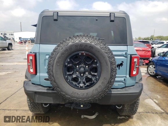 2021 Ford Bronco First Edition with VIN 1FMEE5EP0MLA42596, listed as a Copart auction lot 63210803 with Not Provided miles and . Bid and sale history available at DreamBid. Image 6.